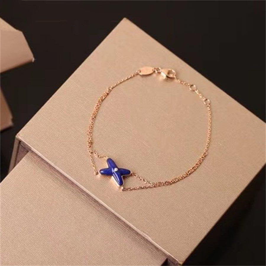 [Lumi Jewels]Hollow Design Four-Leaf Clover Flower Shape Bracelet